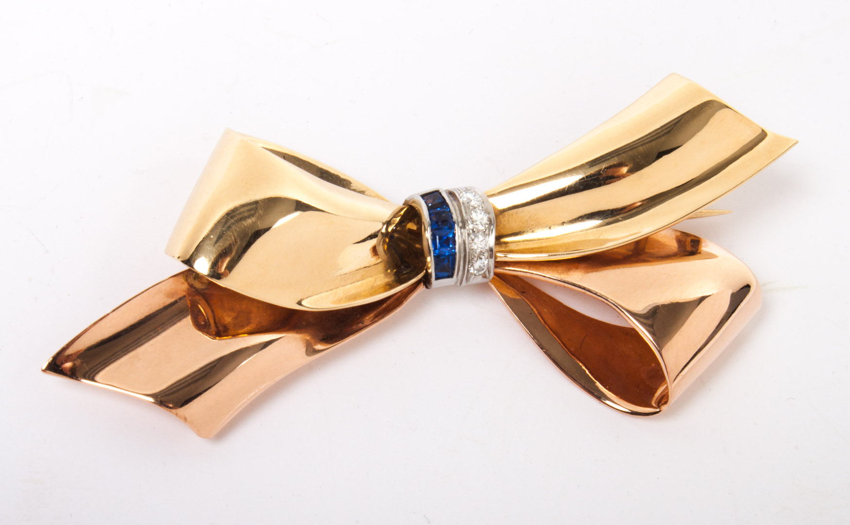 Appraisal: Tiffany Retro styleK gold bow brooch accented with sapphires and