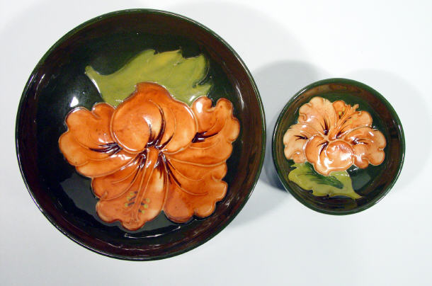 Appraisal: Two graduated Moorcroft pottery bowls hand painted and tubelined with