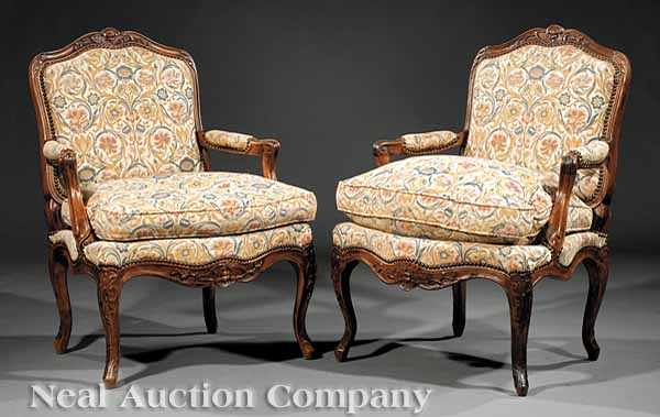 Appraisal: A Pair of Antique French Provincial Carved Fruitwood Fauteuils arched