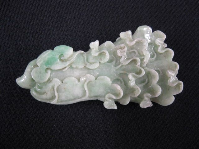 Appraisal: Chinese Carved Jade Pendantof a cabbage rose fine coloring long