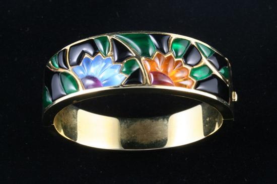 Appraisal: SIGNED K YELLOW GOLD AND CARVED GEMSTONE HINGED OVAL BANGLE