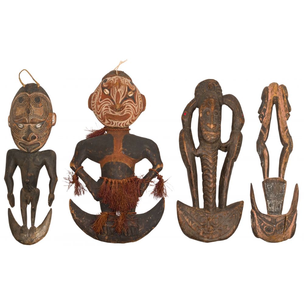 Appraisal: OCEANIC CARVED WOOD FIGURINE ASSORTMENT items including having painted motifs