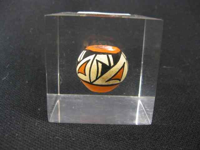 Appraisal: Jemez Miniature Pottery Jar encased in '' x '' lucite