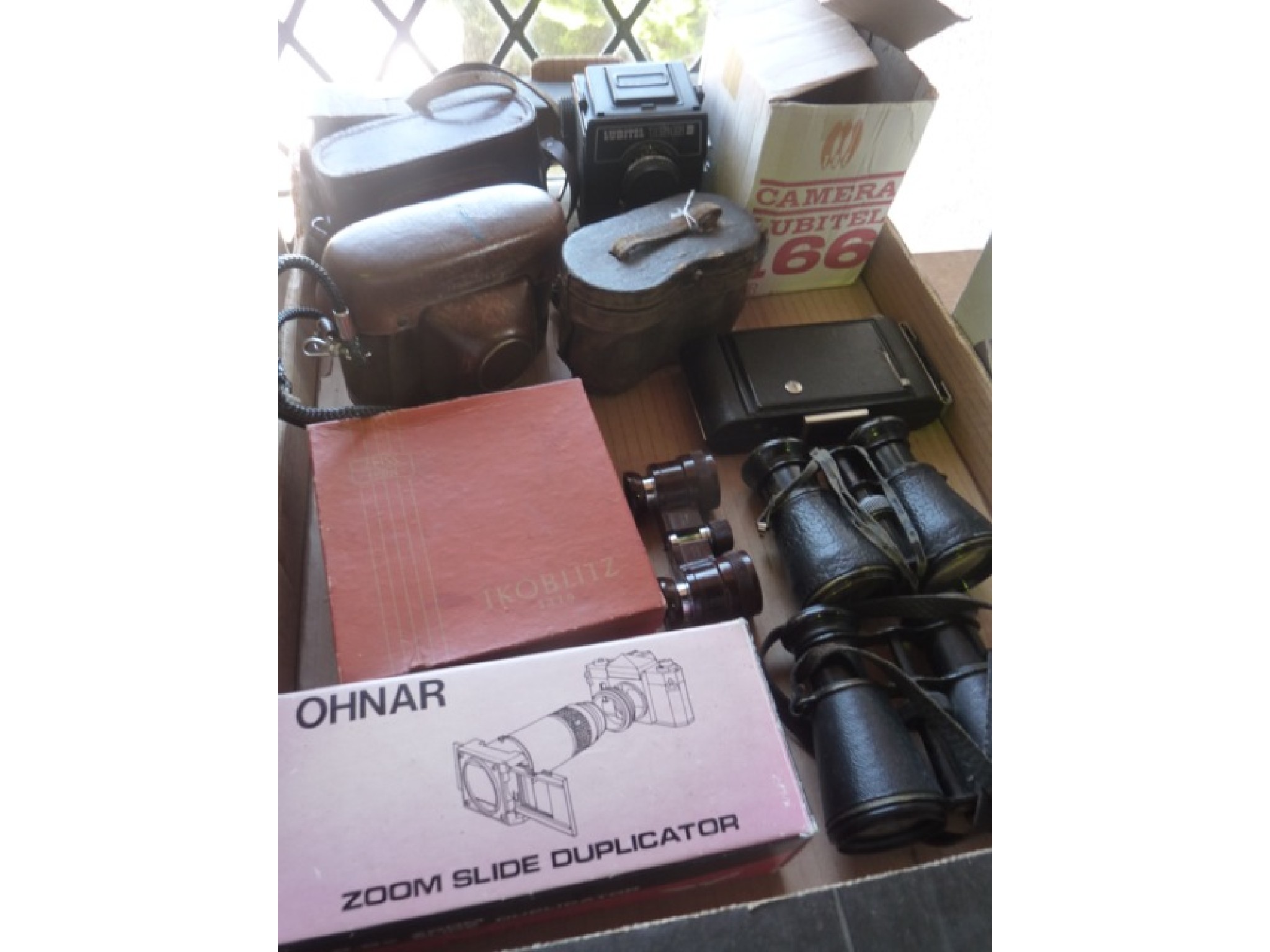 Appraisal: A box containing a selection of binoculars to include Bakelite