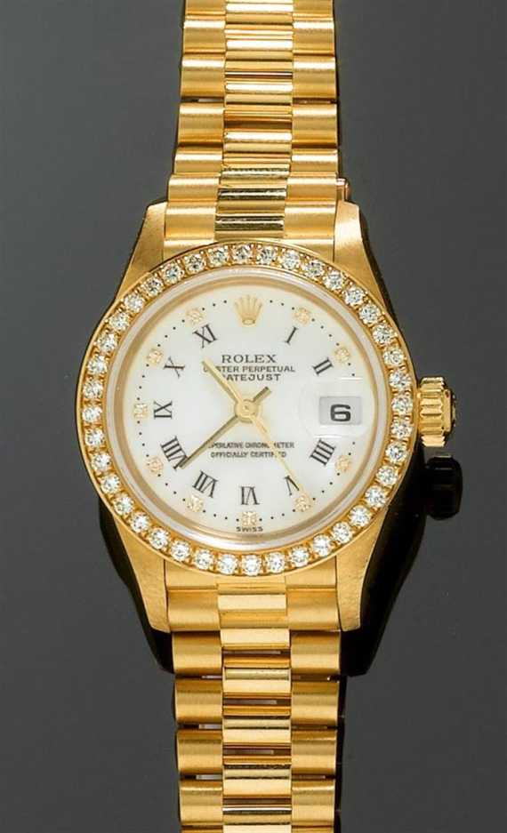 Appraisal: DIAMOND LADY'S WRISTWATCH ROLEX DATEJUST Yellow gold Ref Tonneau-shaped case