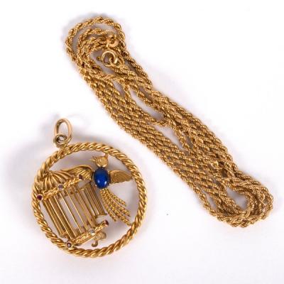 Appraisal: An ct gold and gem set pendant modelled as a