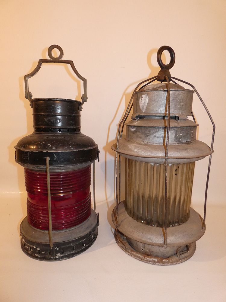 Appraisal: ANTIQUE SHIP LANTERNS Lot of two in tall metal ship