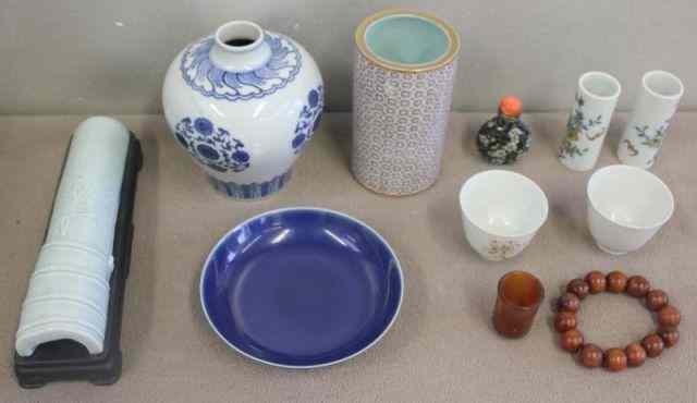 Appraisal: Asian Lot Includes a low blue bowl with underglaze character