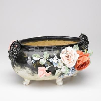 Appraisal: FRENCH FAIENCE Centerpiece bowl with applied floral decoration th th