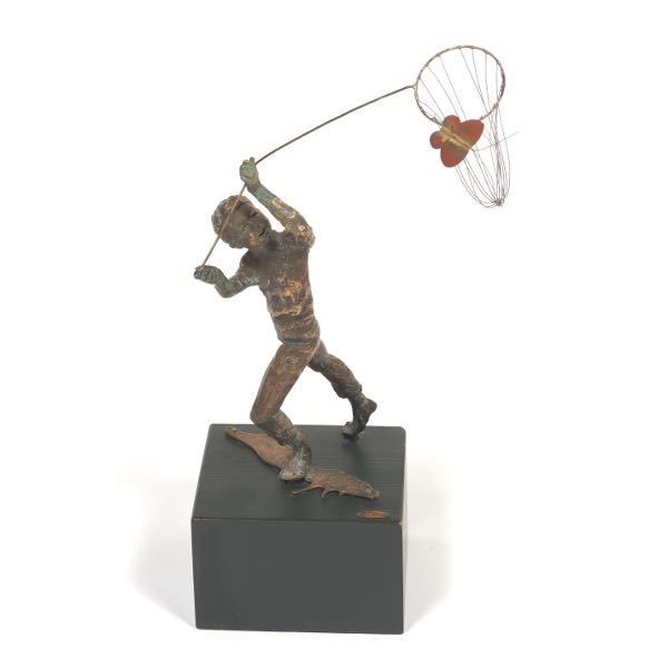 Appraisal: CURTIS JERE AMERICAN - Boy chasing a butterfly Bronze sculpture