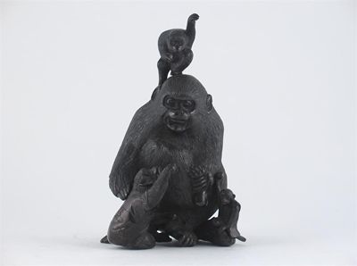 Appraisal: A Japanese bronze model of a monkey seated and with