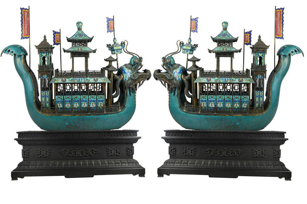 Appraisal: PAIR OF CHINESE CLOISONNE DRAGON BOATSeach resting on a wood