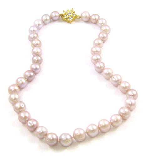 Appraisal: PRINCESS LENGTH PINK PEARL NECKLACE strung with well matched pink