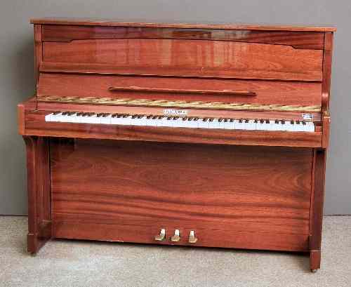 Appraisal: A modern Ritmuller upright piano in mahogany case ins wide