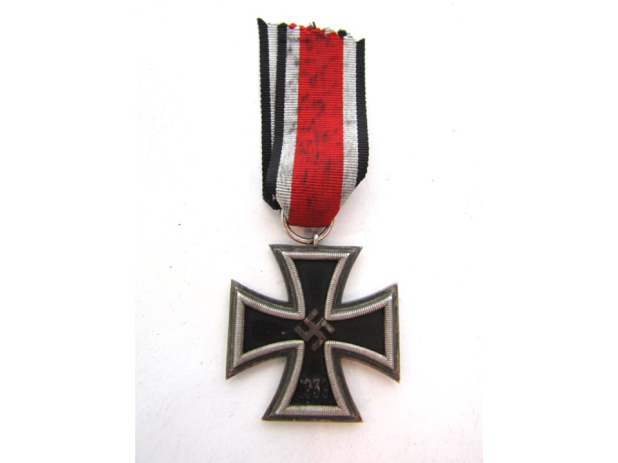 Appraisal: A World War Two iron cross and ribbon