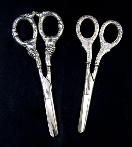 Appraisal: TWO PAIRS OF STERLING GRAPE SHEARS Each a different grape