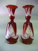 Appraisal: A pair of hand blown overlay ruby etched and painted