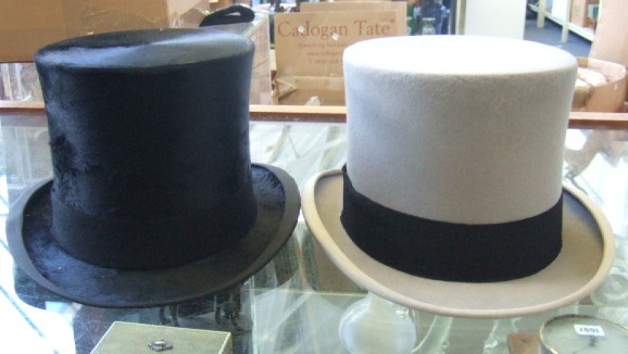 Appraisal: A silk top hat Andre Co and a Lock Co