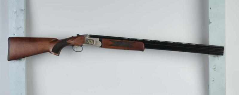 Appraisal: Mossberg Silver Reserve Over Under Shotgun Description GA - shells