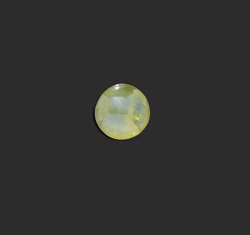 Appraisal: UNMOUNTED CHRYSOBERYL-CAT'S EYE Round almost transparent honey-coloured chrysoberyl with fine