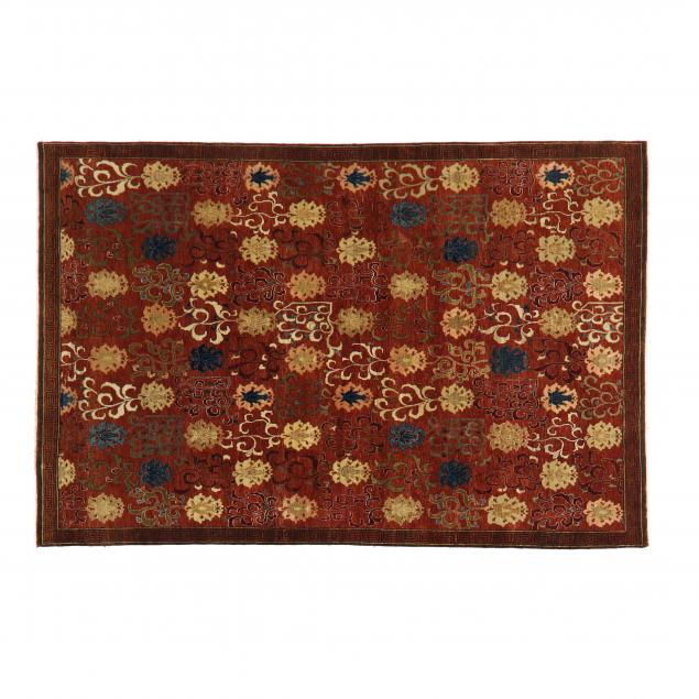 Appraisal: ORIENTAL RUG Brown field with repeating floral motif Greek key