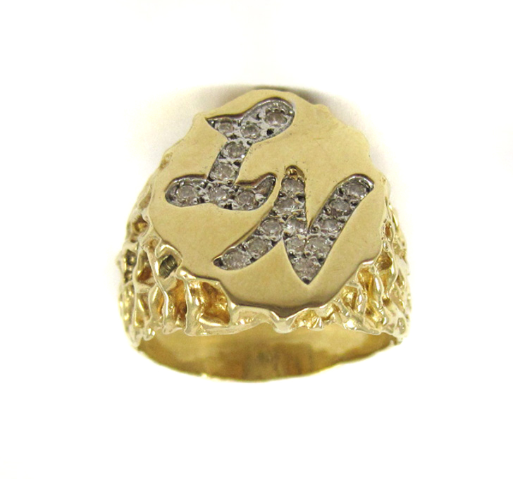 Appraisal: MAN'S GOLD RING with mounted gems ring marked k