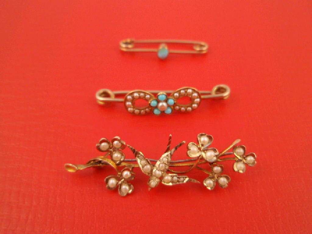 Appraisal: Three Victorian bar brooches one with bluebird and flowers set