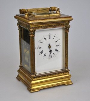 Appraisal: A gilt brass quarter striking carriage clock c with carrying