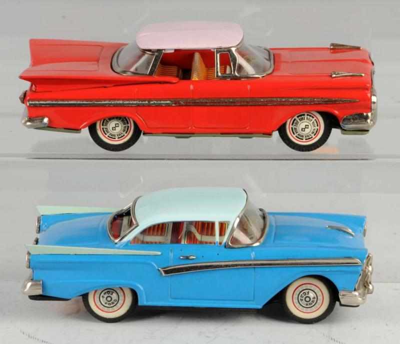 Appraisal: Lot of Tin American Car Friction Toys Description Japanese Working