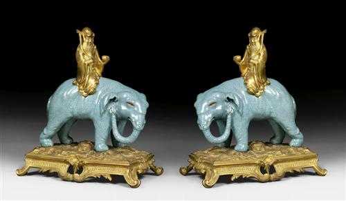 Appraisal: PAIR OF PORCELAIN ELEPHANTS ON BRONZE PLINTHS Louis XV the