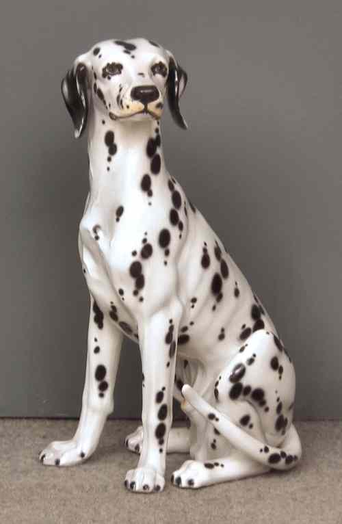 Appraisal: A modern pottery figure of a seated Dalmatian ins high