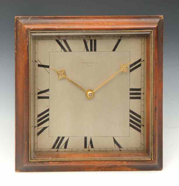 Appraisal: A MANTEL CLOCK in simple mahogany frame with square cut