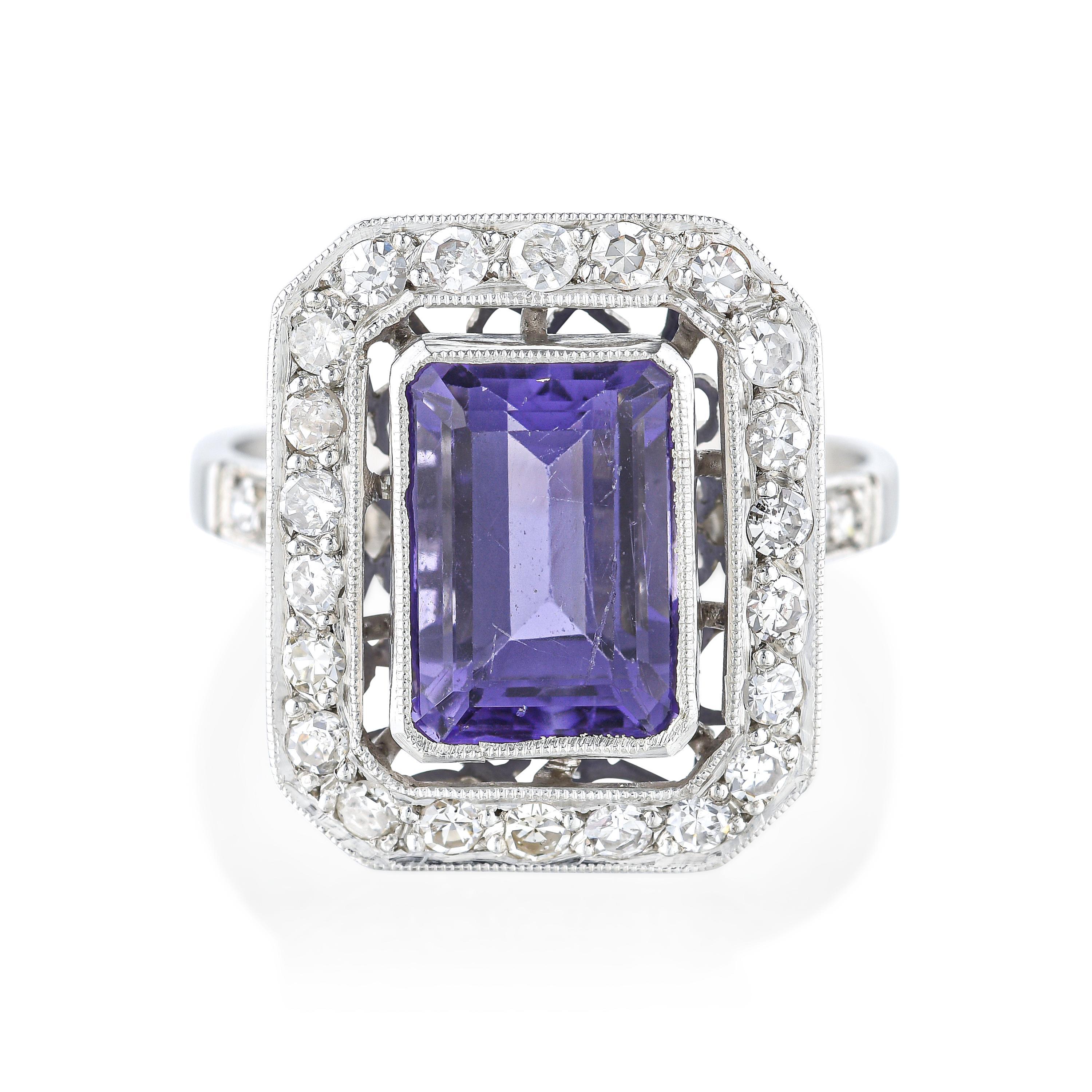 Appraisal: TANZANITE AND DIAMOND RING METAL platinumGEMSTONE S rectangular faceted tanzanite