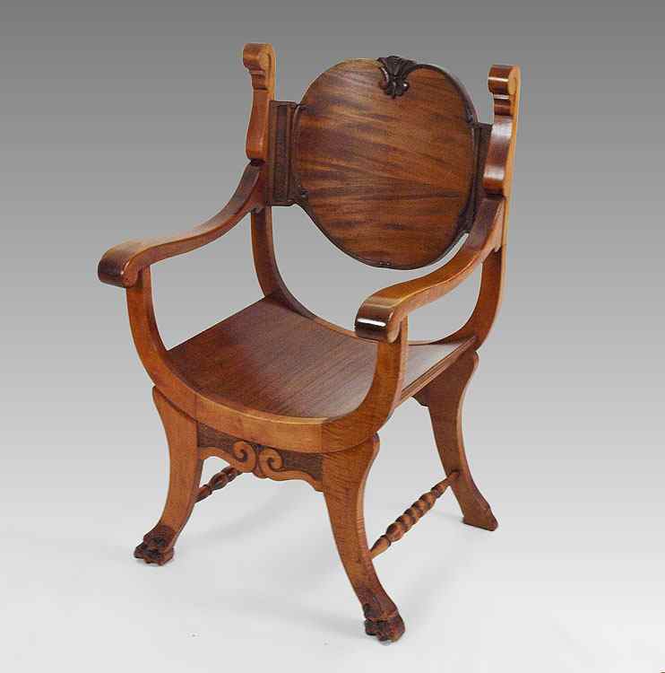 Appraisal: CARVED SAVONAROLA CHAIR Carved back with carved apron and carved