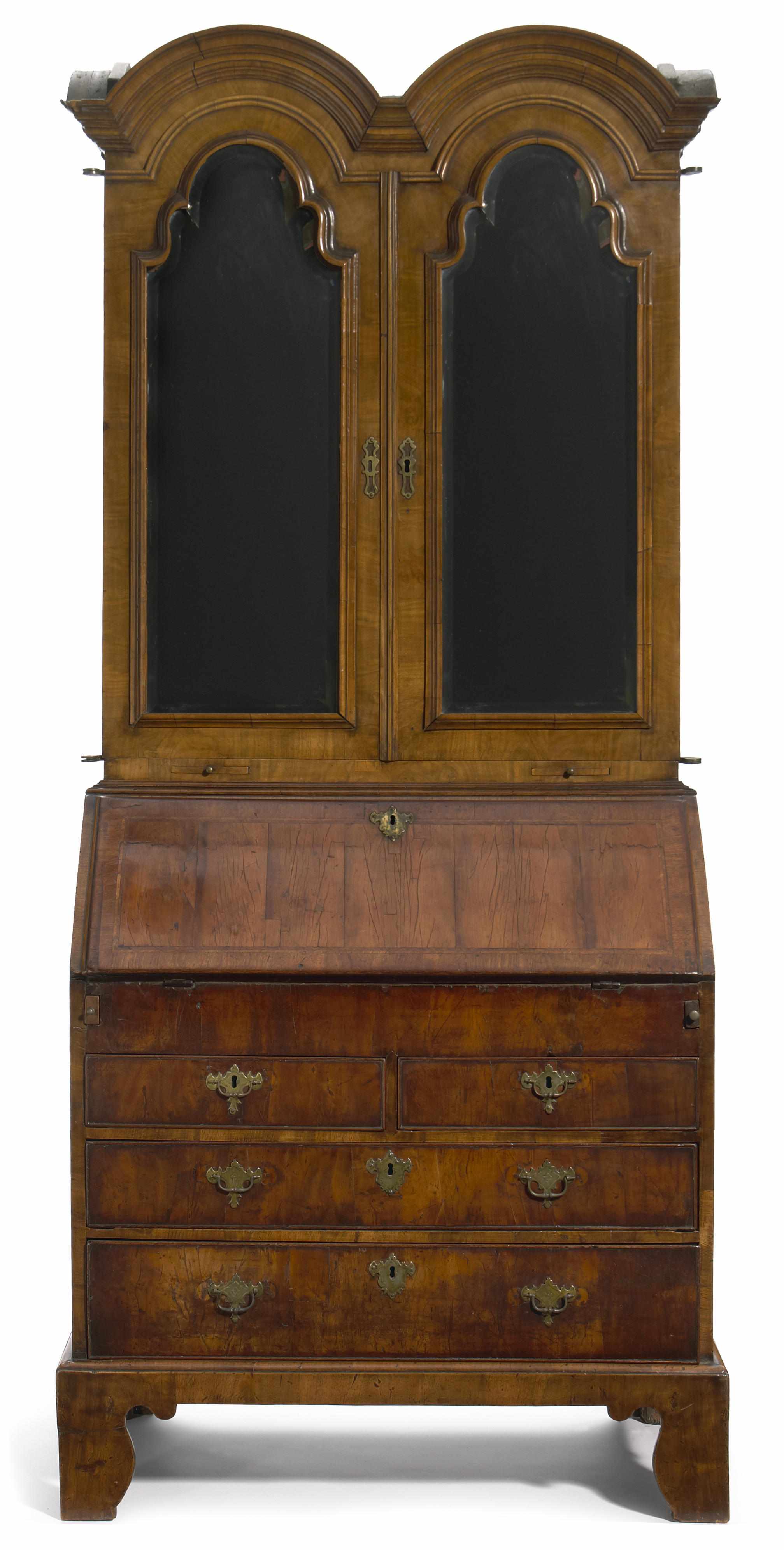 Appraisal: A Queen Anne featherbanded walnut double domed top secretary cabinet