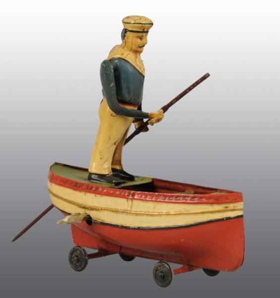 Appraisal: Tin Hand-Painted Man Rowing Boat Wind-Up Toy Description German Working