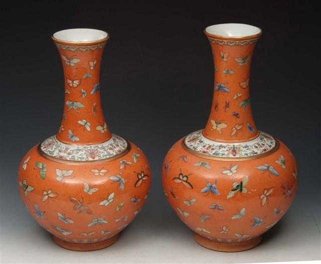 Appraisal: A PAIR OF CHINESE GUAN YU PORCELAIN BALUSTER VASES decorated