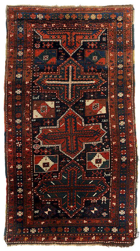 Appraisal: Caucasian Rug early-mid th century three medallions on navy ground