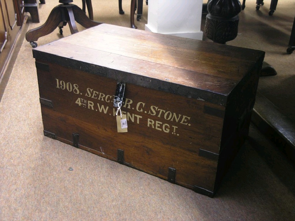 Appraisal: An Edwardian army Sergeant's trunk teak with sheet iron mounts