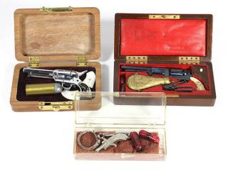 Appraisal: lot of Miniature cap pistols comprising a cased miniature Colt