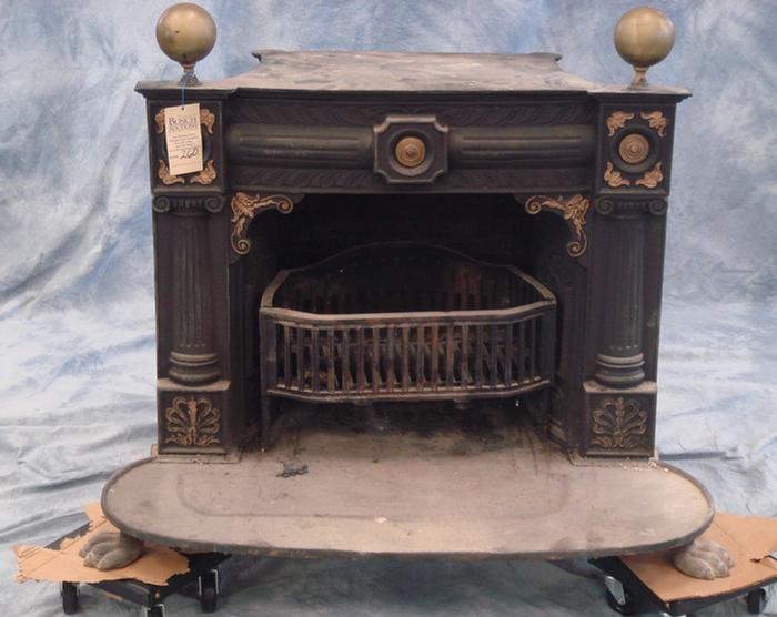 Appraisal: Cast iron and brass parlor stove early th c unmarked