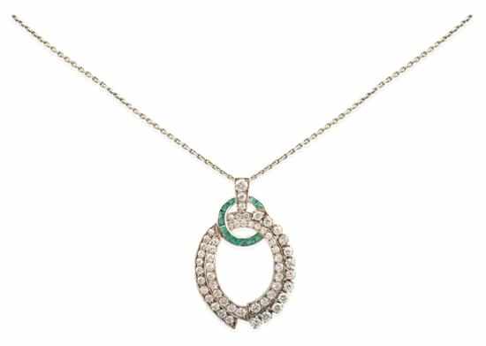 Appraisal: AN ART DECO EMERALD AND DIAMOND PENDANT The open oval