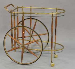 Appraisal: Mid-Century brass and wood drink cart with large spoked wheels