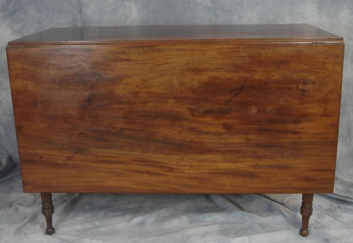 Appraisal: Mahogany Sheraton reeded leg drop leaf table w w leaves