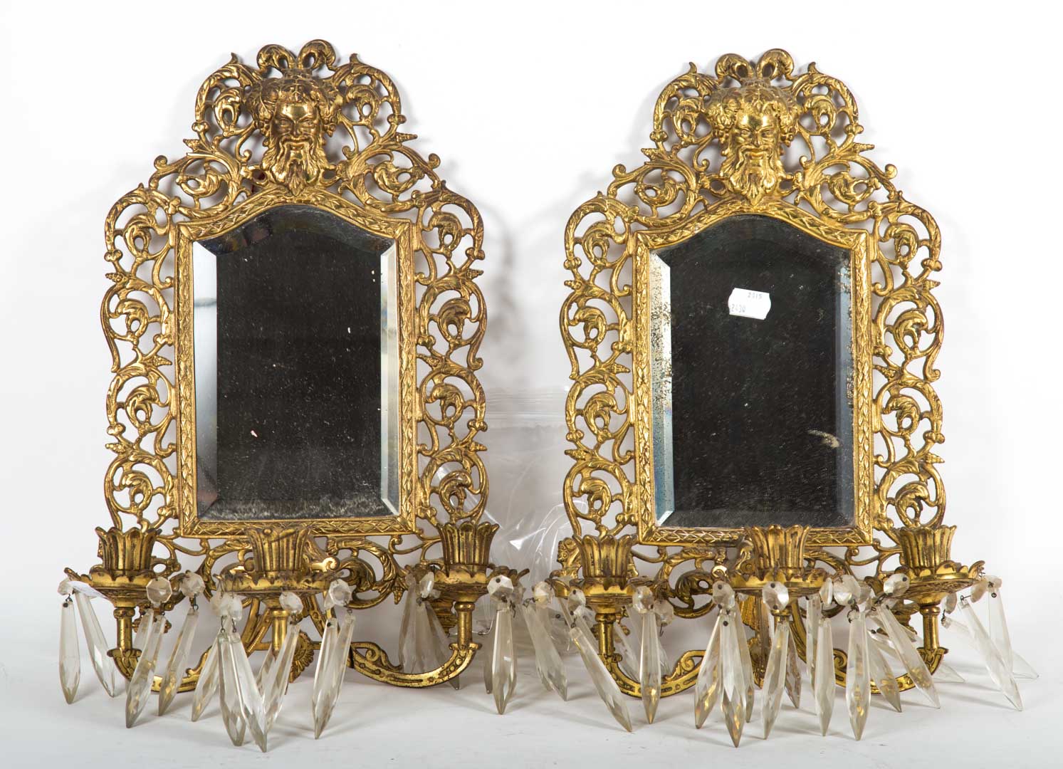 Appraisal: Pair of brass framed wall mirrors Undernumber