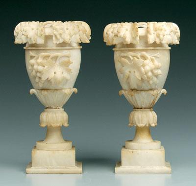 Appraisal: Pair alabaster urns - in Extensive stains several chips some