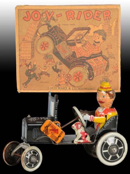 Appraisal: Marx Tin Wind-Up Joy-Rider Toy Car Description All tin Wind-up