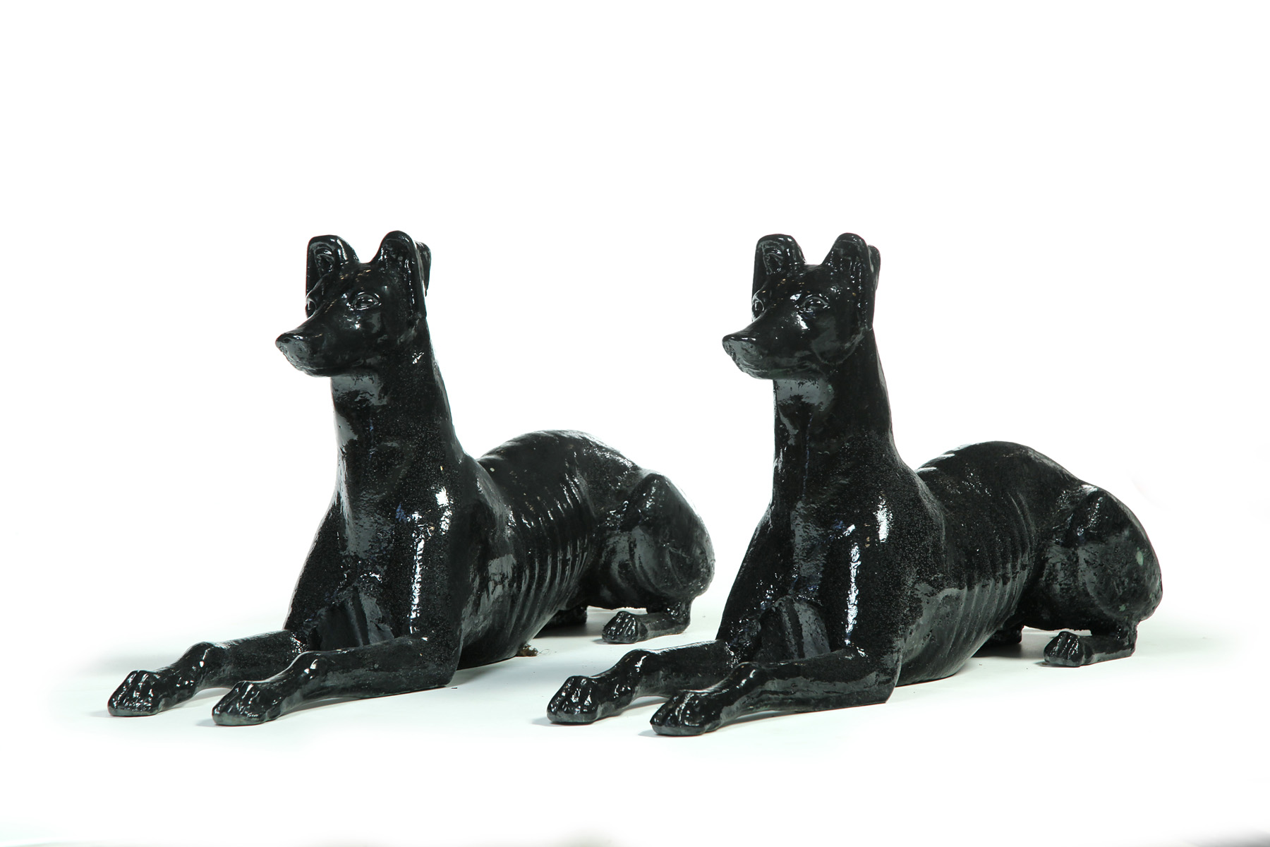 Appraisal: PAIR OF AMERICAN CAST IRON WHIPPETS Late th century Reclining