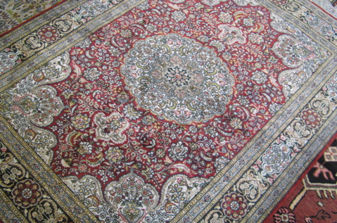 Appraisal: HAND KNOTTED ORIENTAL AREA RUG Sino-Persian floral and central floral