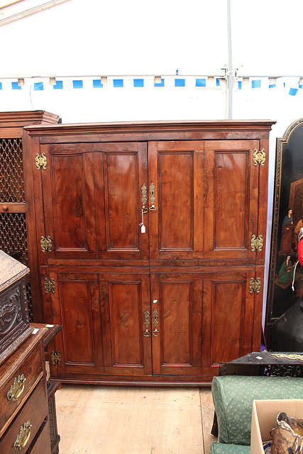 Appraisal: AN ANTIQUE FRENCH YEW WOOD ARMOIRE with cornice above two